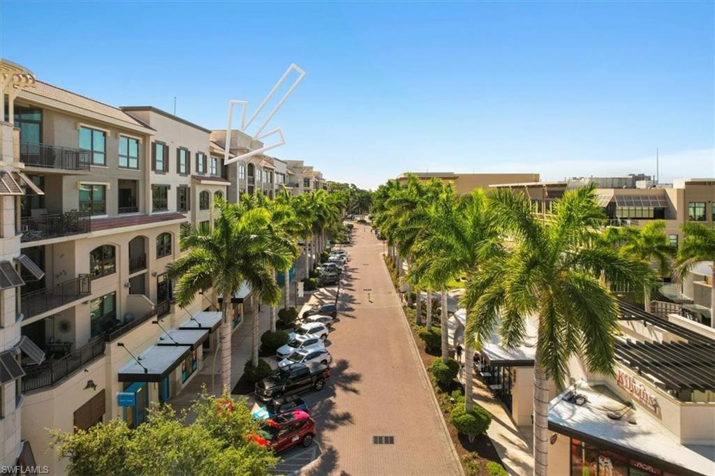 9115 Strada Place, Unit 5512 Naples, FL 34108 - Photo 3 of 42 a view of a multi story building