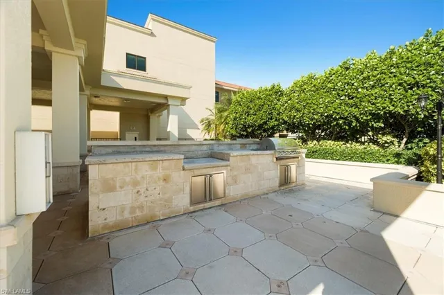 a view of swimming pool with outdoor seating