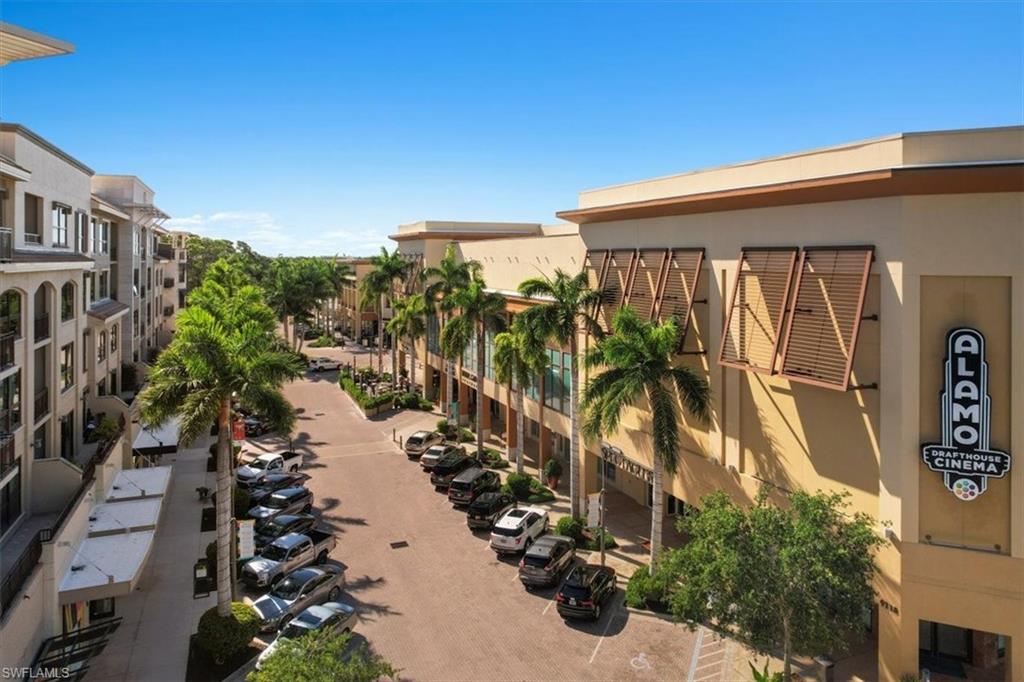9115 Strada Place, Unit 5512 Naples, FL 34108 - Photo 40 of 42 a view of a house with a yard