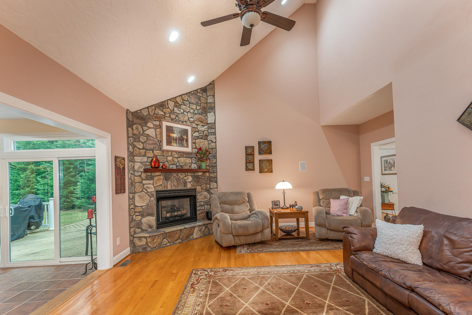 74 Chesney Place Blue Ridge, VA 24064 - Photo 14 of 71 a living room with furniture large window and a fireplace