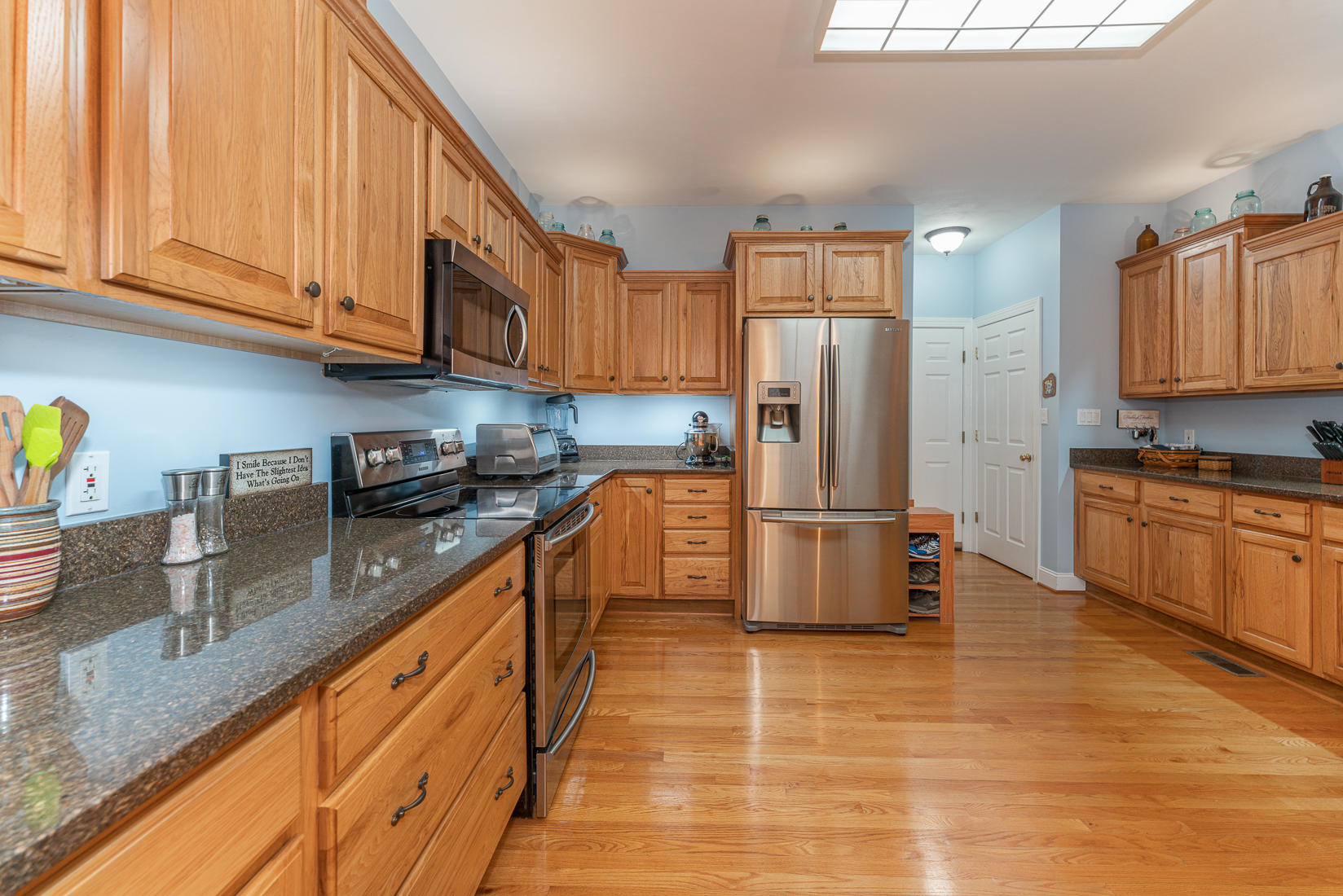 74 Chesney Place Blue Ridge, VA 24064 - Photo 24 of 71 a kitchen with stainless steel appliances granite countertop a refrigerator sink and stove