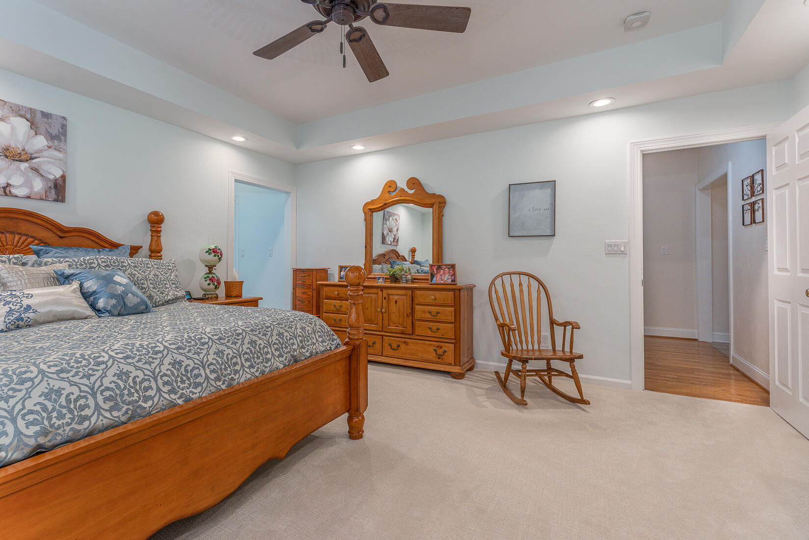 74 Chesney Place Blue Ridge, VA 24064 - Photo 32 of 71 a bedroom with a bed and a chandelier