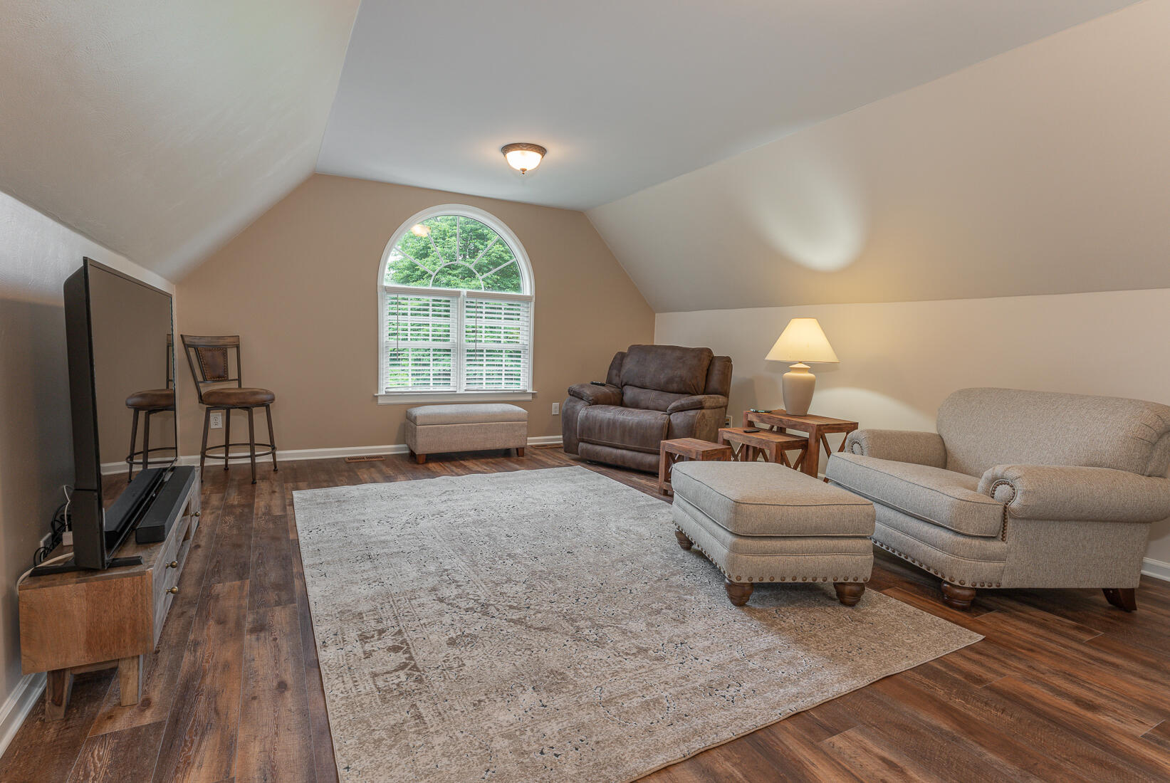 74 Chesney Place Blue Ridge, VA 24064 - Photo 44 of 71 a living room with furniture a flat screen tv and a large window