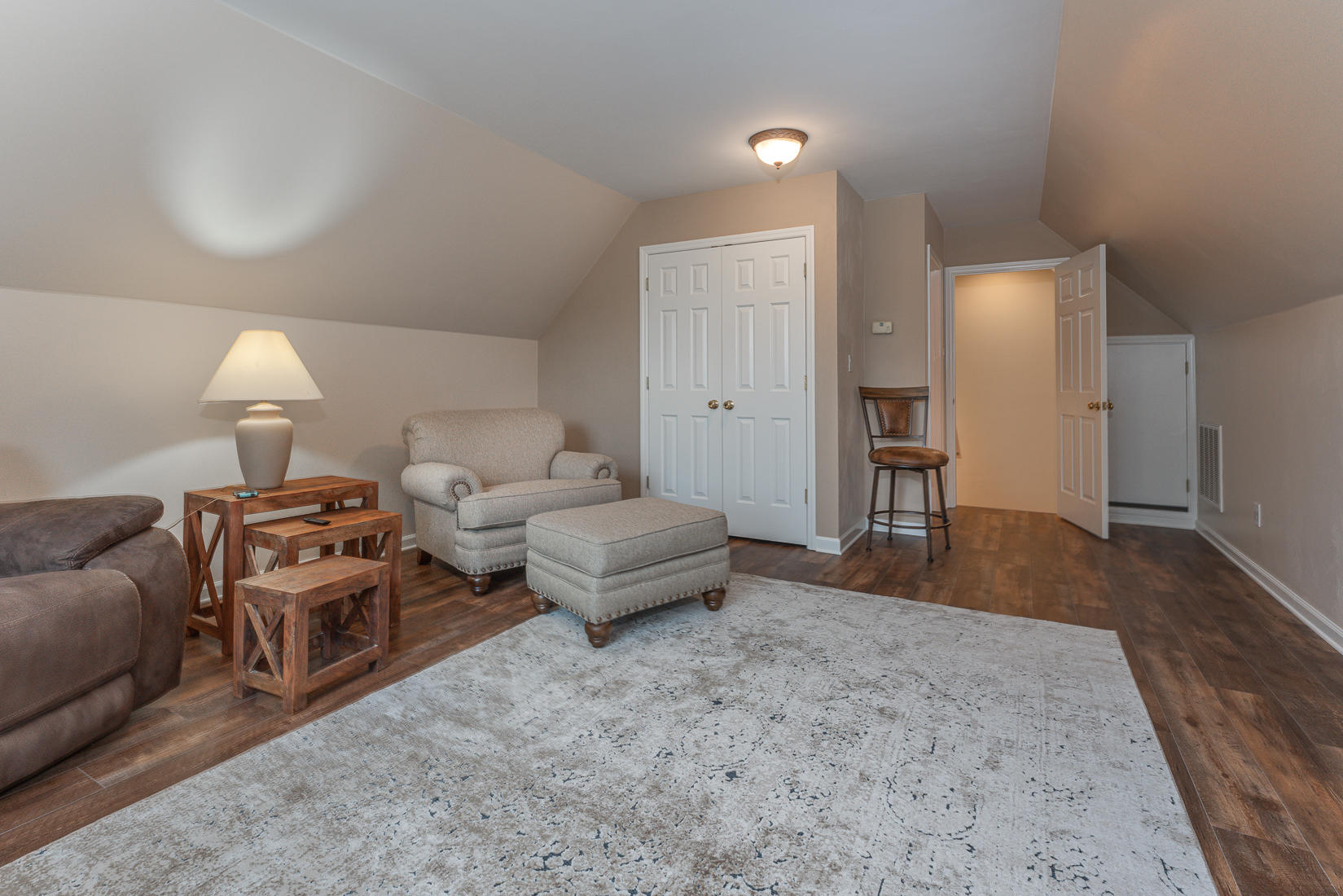 74 Chesney Place Blue Ridge, VA 24064 - Photo 47 of 71 a bedroom with furniture and a wooden floor