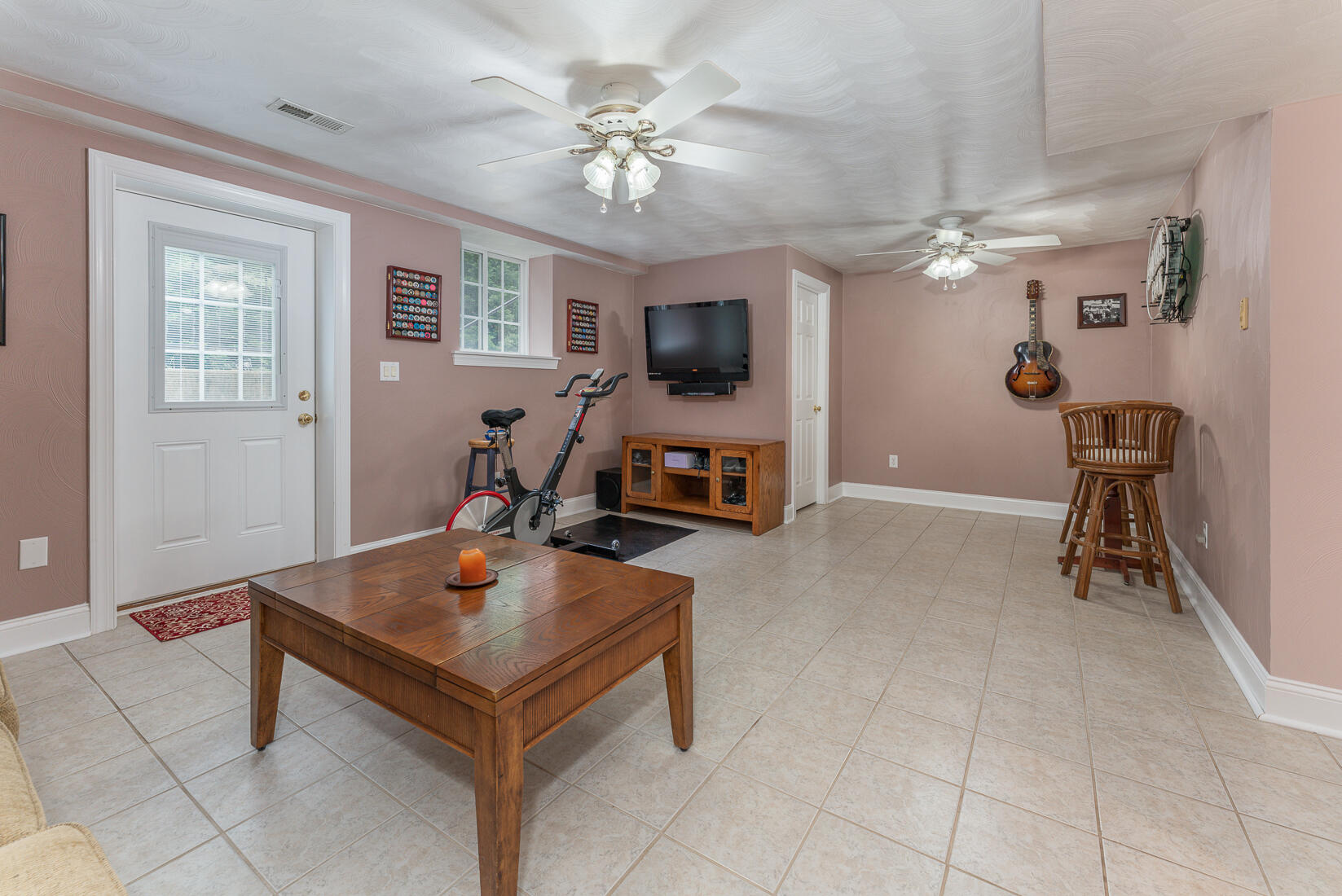 74 Chesney Place Blue Ridge, VA 24064 - Photo 50 of 71 a living room with furniture and a flat screen tv