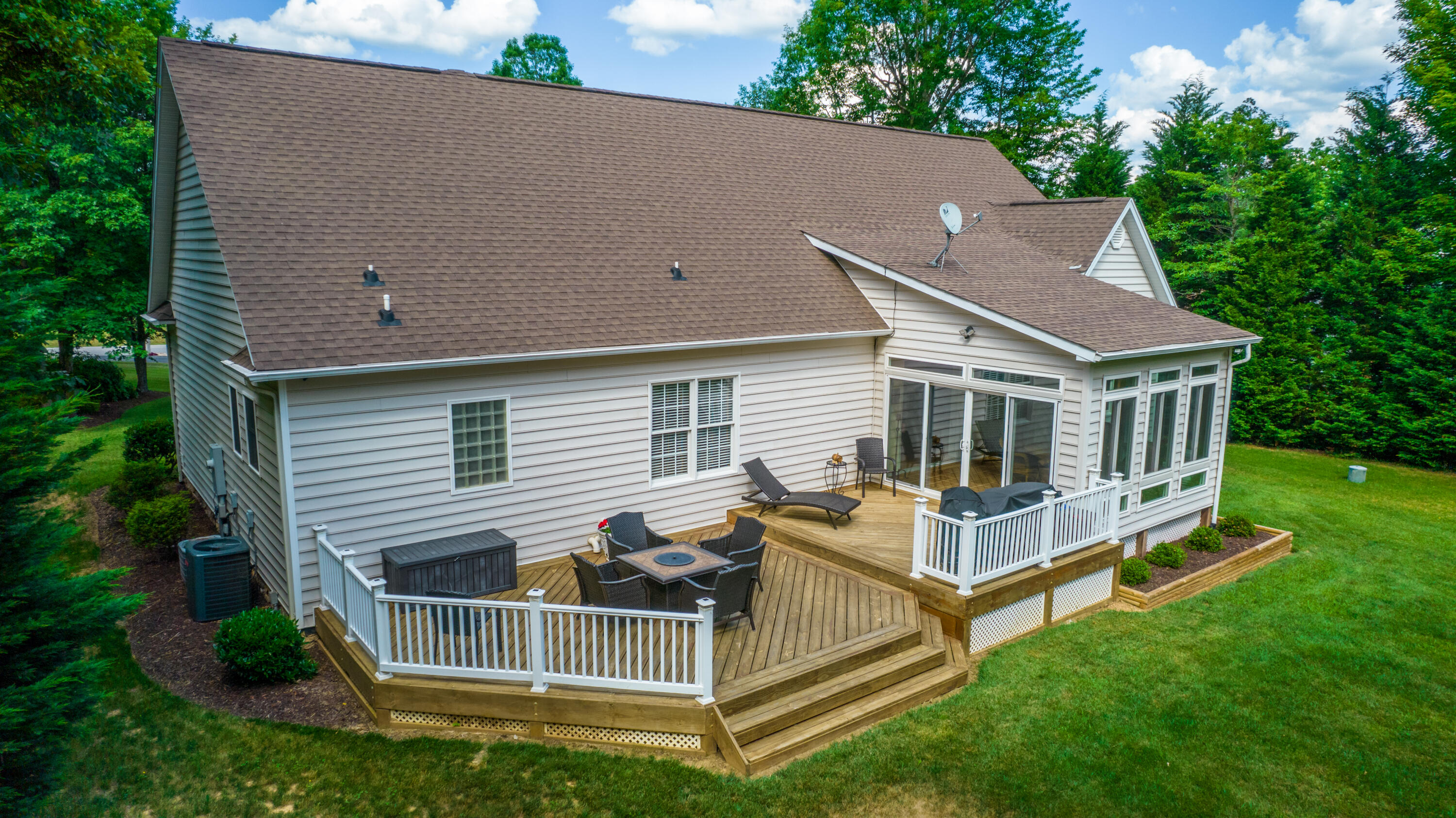 74 Chesney Place Blue Ridge, VA 24064 - Photo 59 of 71 a view of a house with a yard and sitting area