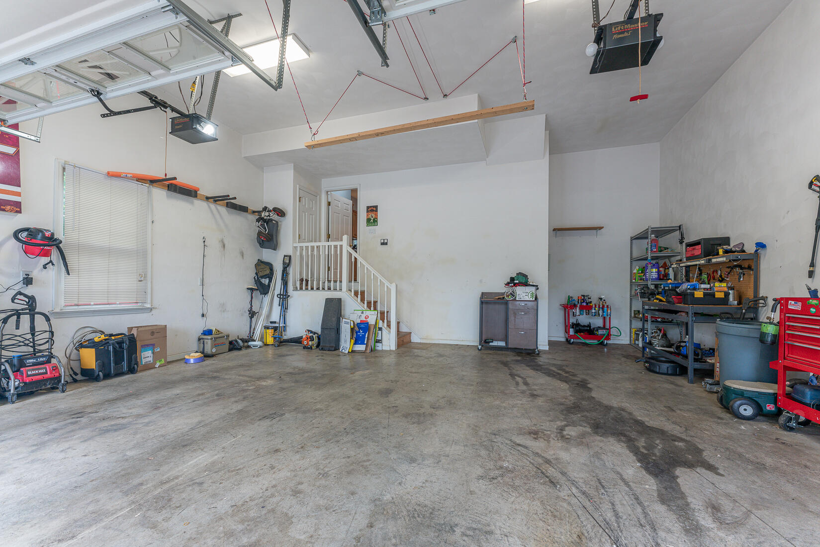 74 Chesney Place Blue Ridge, VA 24064 - Photo 68 of 71 a view of a garage with storage and utility room
