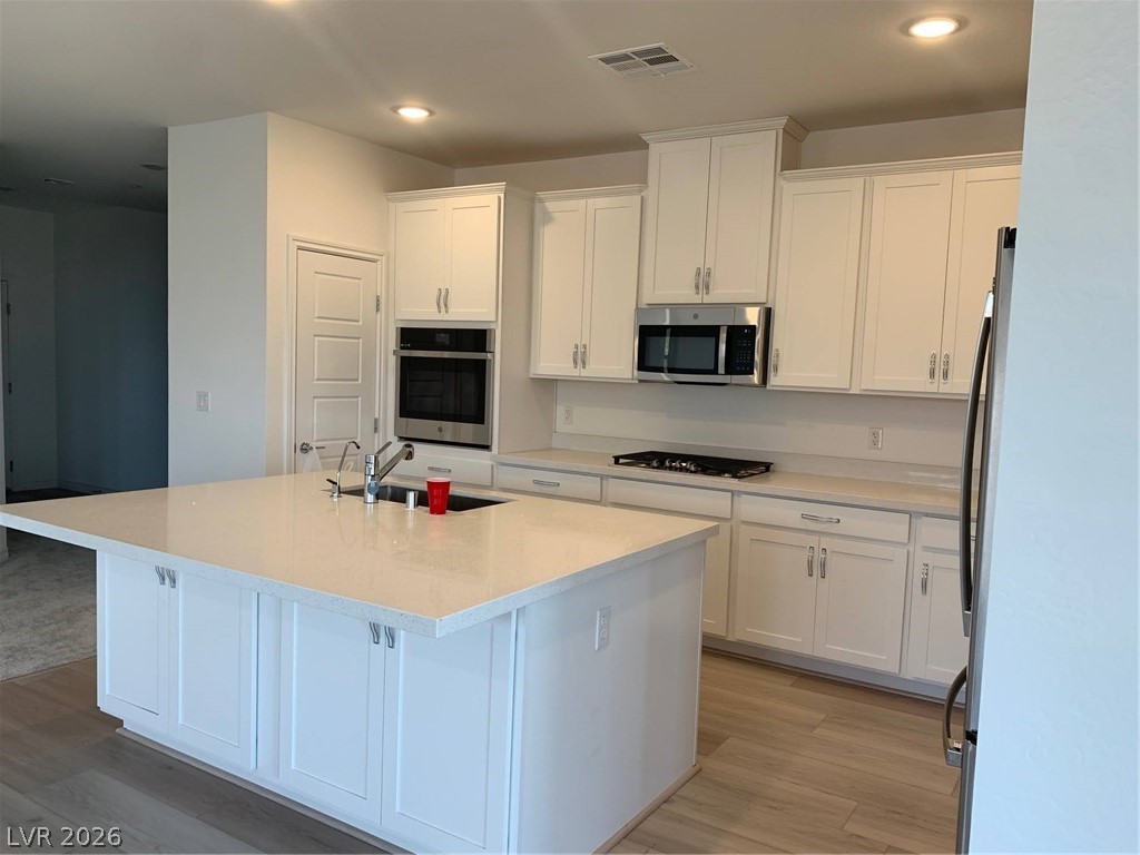 2555 Hampton Road, Unit 7109 Henderson, NV 89052 - Photo 15 of 34 Clean lines and a functional layout define this well-appointed culinary space.