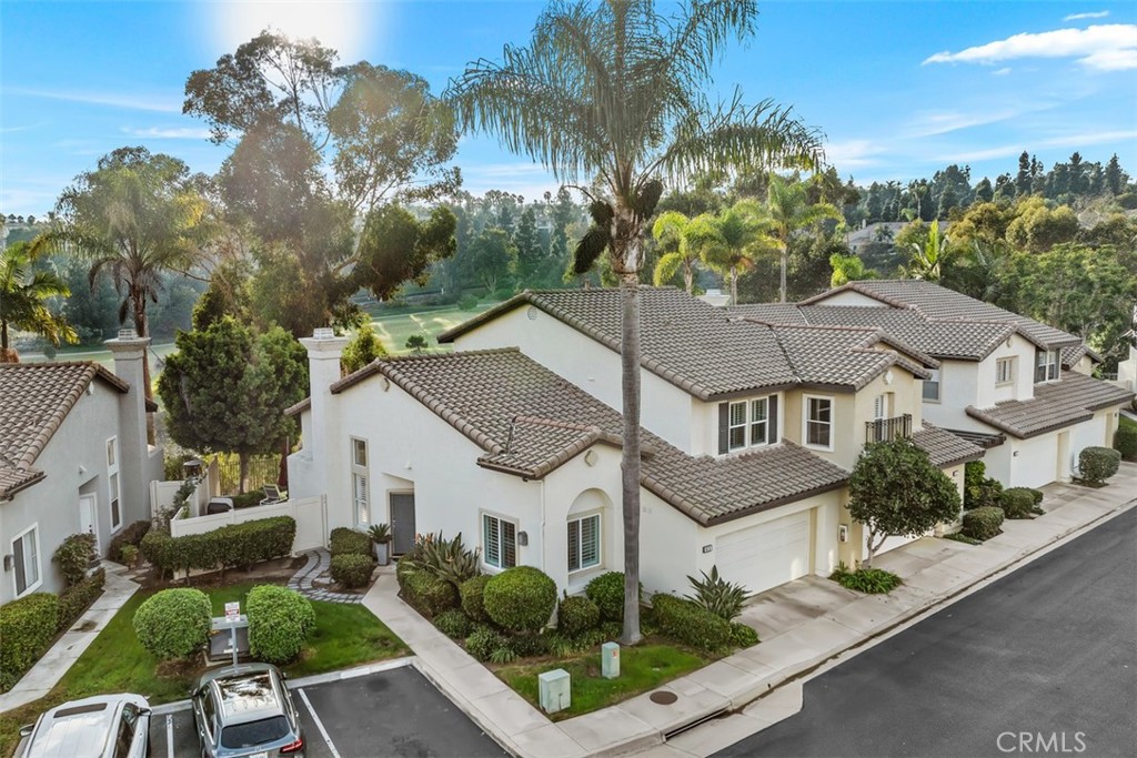 an aerial view of house with yard