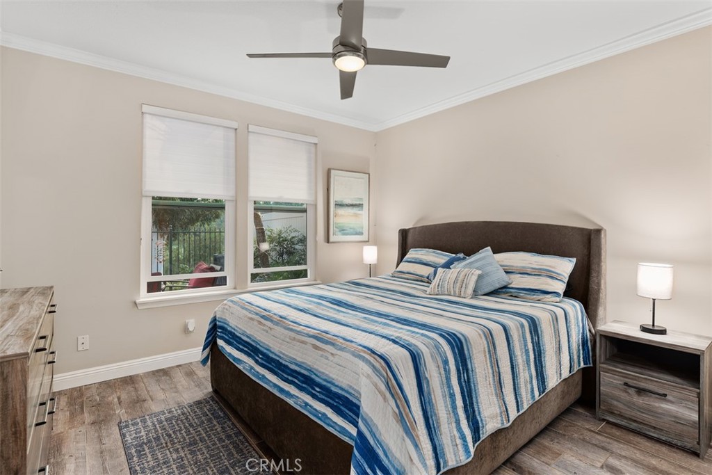 6819 Adolphia Drive Carlsbad, CA 92011 - Photo 27 of 40 a bedroom with a bed lamp and window
