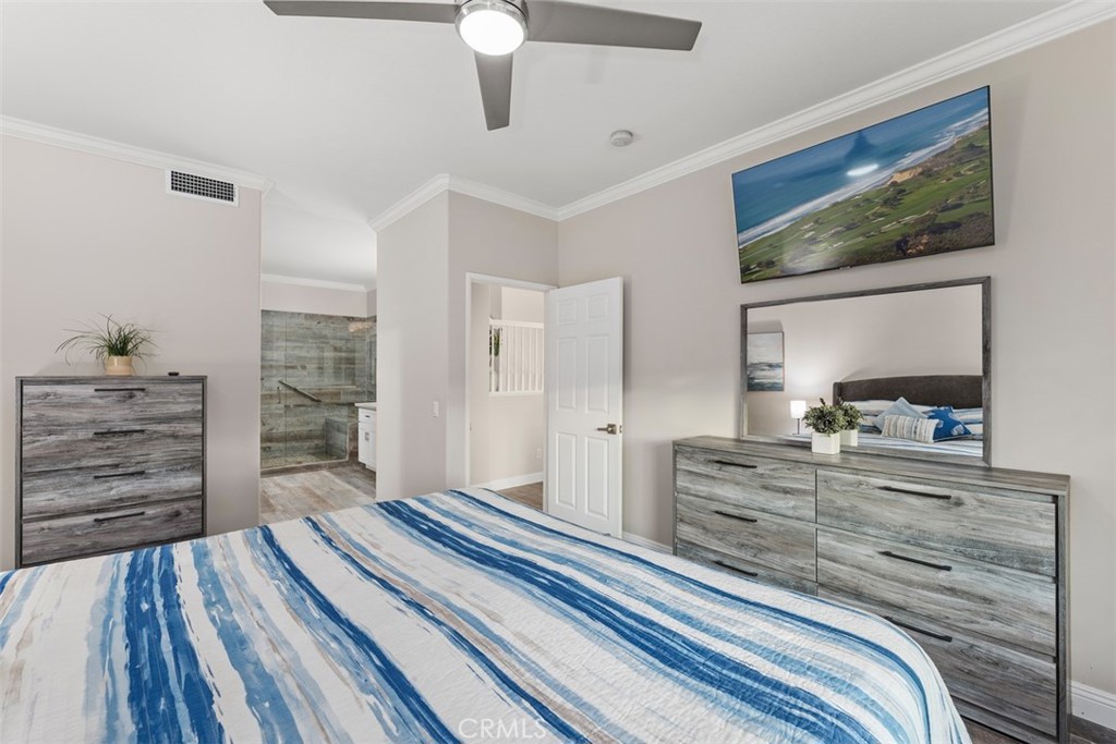 6819 Adolphia Drive Carlsbad, CA 92011 - Photo 28 of 40 a bedroom with a bed and a dresser