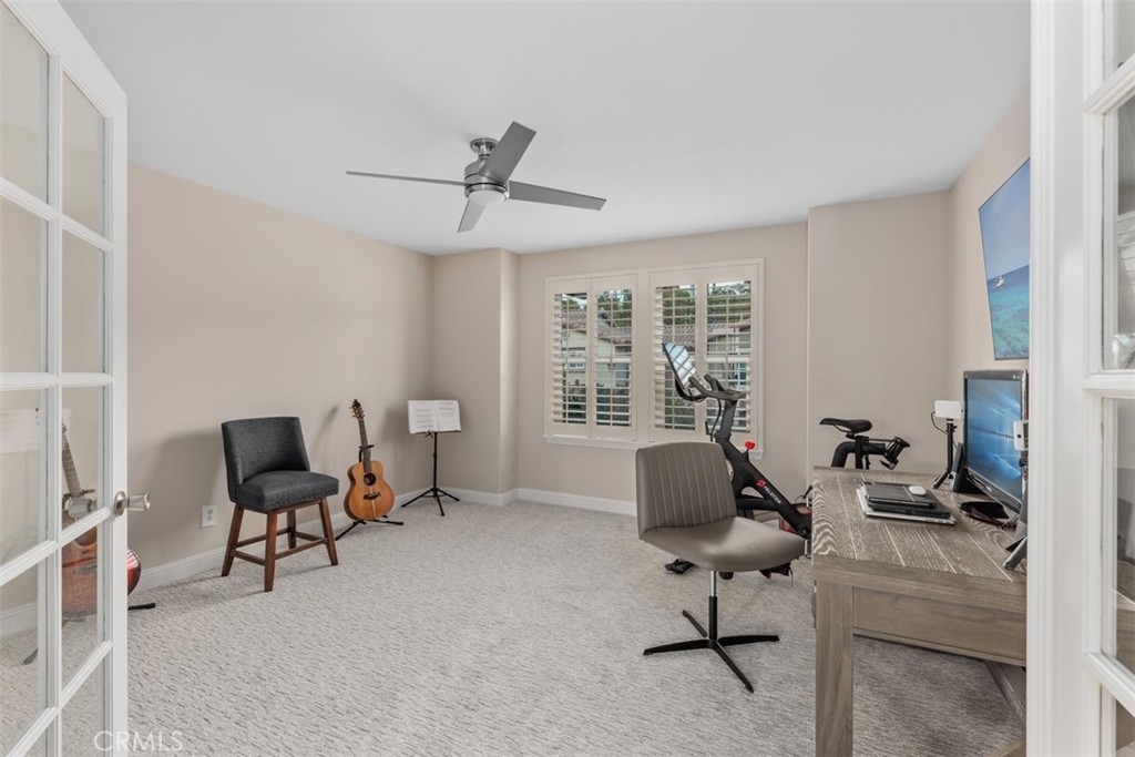 6819 Adolphia Drive Carlsbad, CA 92011 - Photo 34 of 40 a view of a workspace with furniture and a window