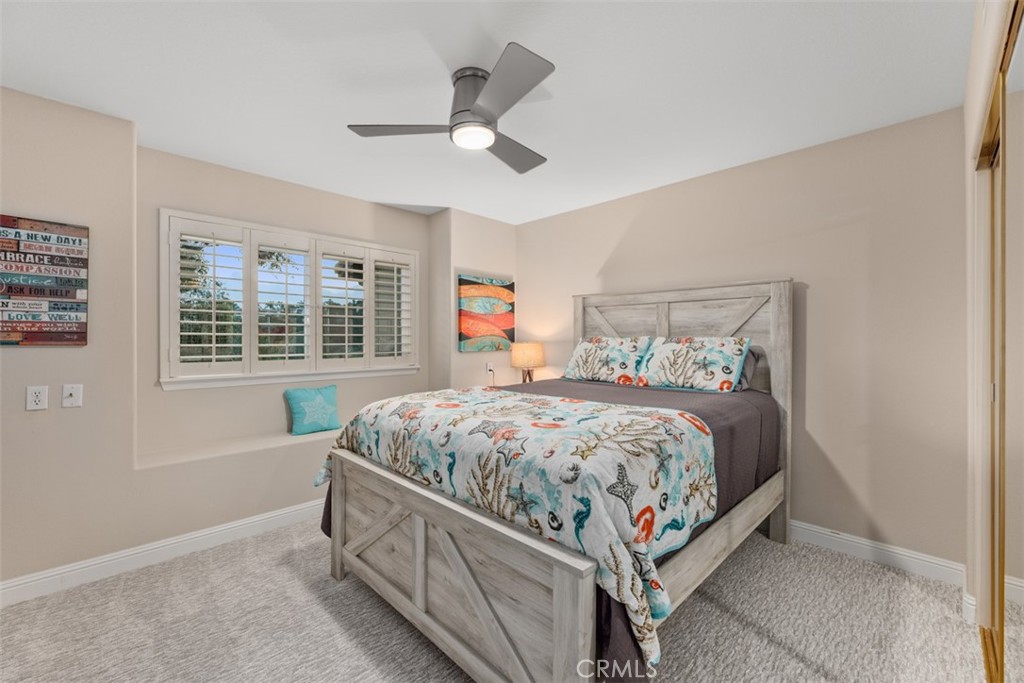 6819 Adolphia Drive Carlsbad, CA 92011 - Photo 35 of 40 a bed sitting in a bedroom next to a window