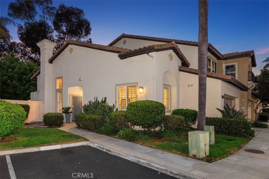 6819 Adolphia Drive Carlsbad, CA 92011 - Photo 37 of 40 a front view of a house with garden