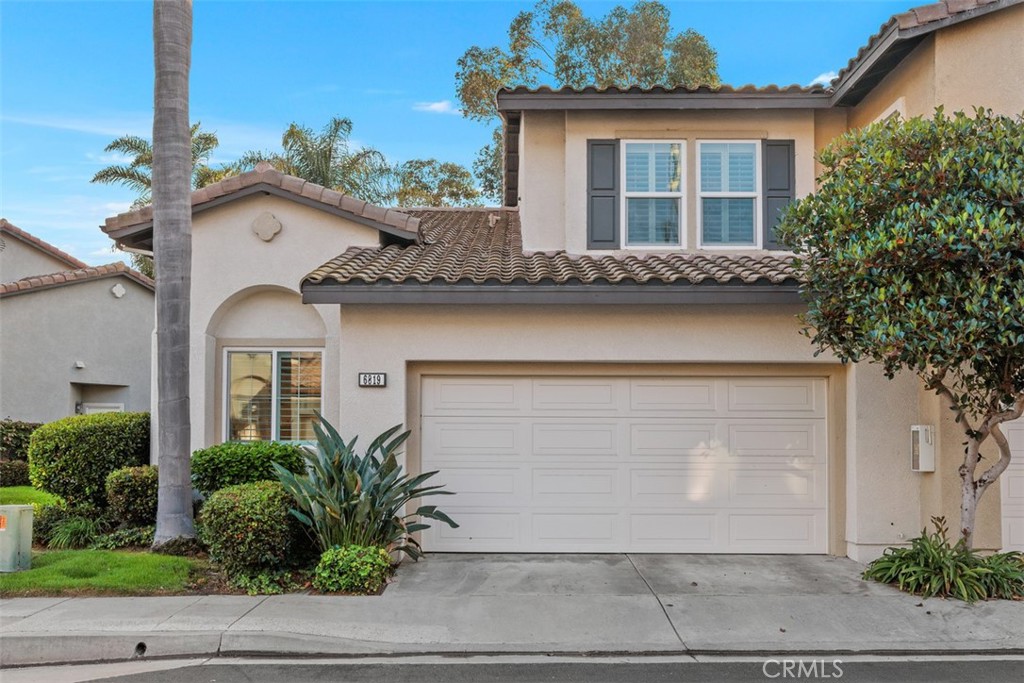 6819 Adolphia Drive Carlsbad, CA 92011 - Photo 39 of 40 a front view of a house with garden