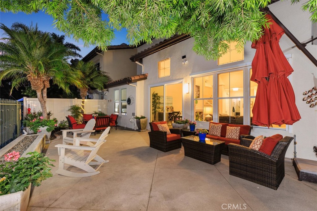 6819 Adolphia Drive Carlsbad, CA 92011 - Photo 5 of 40 a living room with patio furniture and a potted plant