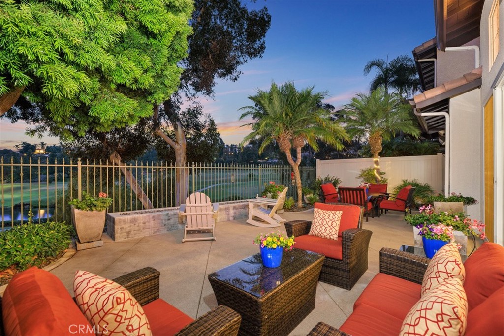 6819 Adolphia Drive Carlsbad, CA 92011 - Photo 6 of 40 a view of a patio with couches chairs and a potted plant