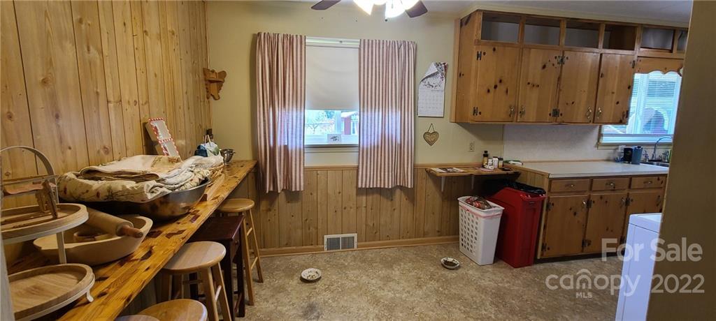 610 Dover Church Road Star, NC 27356 - Photo 11 of 35 a bed room with a bed and a mirror