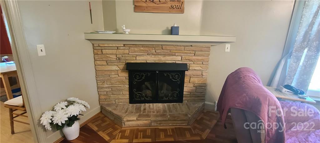 610 Dover Church Road Star, NC 27356 - Photo 7 of 35 a living room with furniture and a fireplace