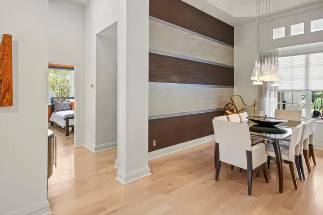 a view of a living room and dining room