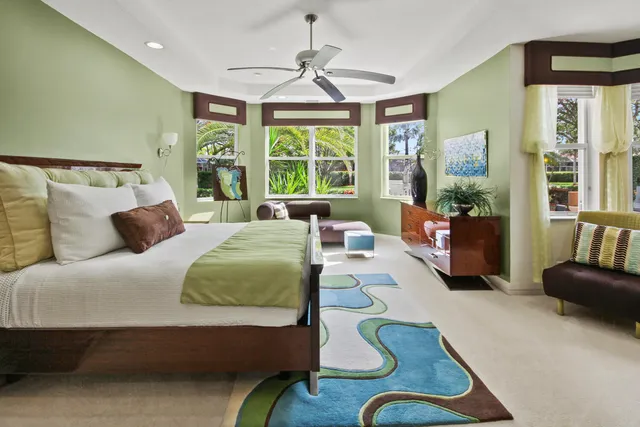 a view of a backyard with sitting area