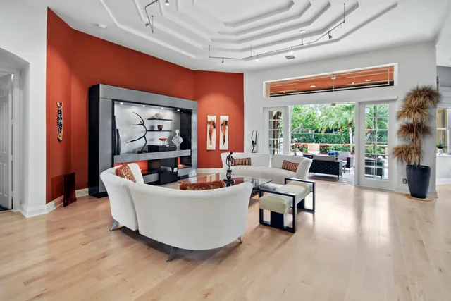 a bedroom with double bed and a dresser