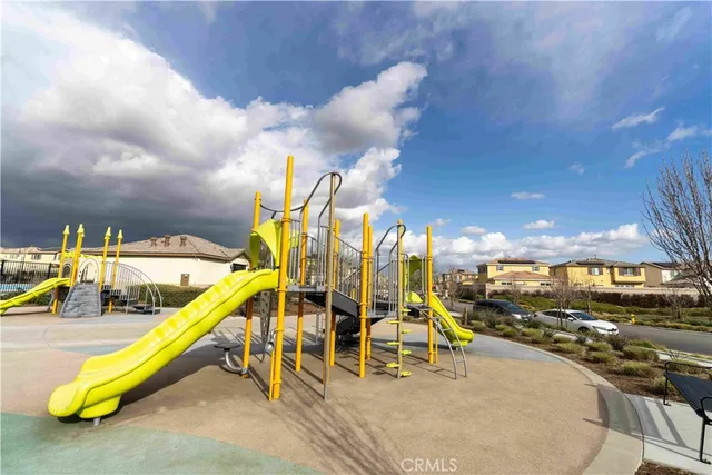 a view of a park with swings