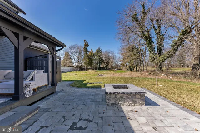 a view of swimming pool with a yard