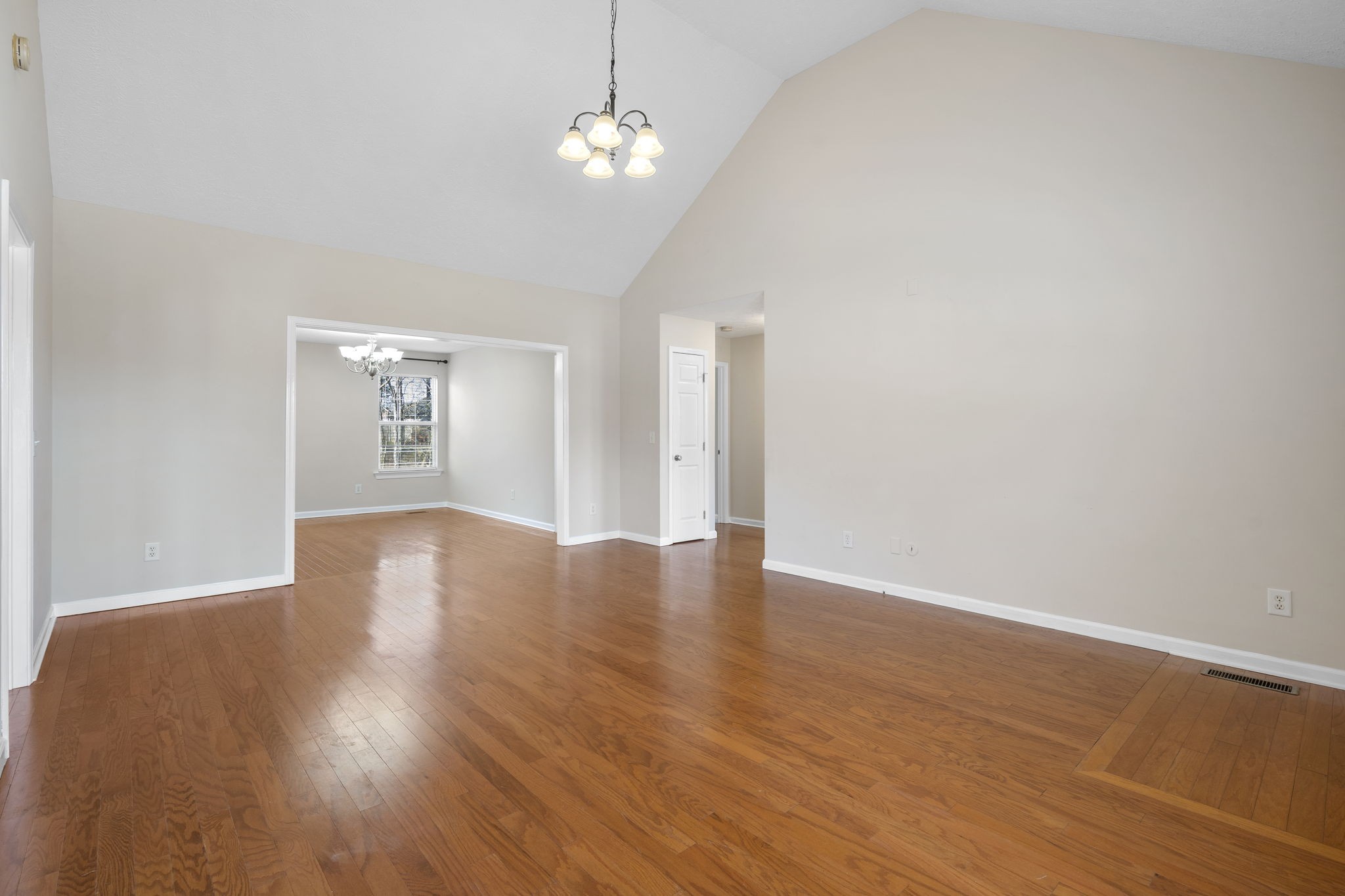 4244 Birmingham Road Lebanon, TN 37090 - Photo 11 of 40 a view of an empty room with wooden floor and a window