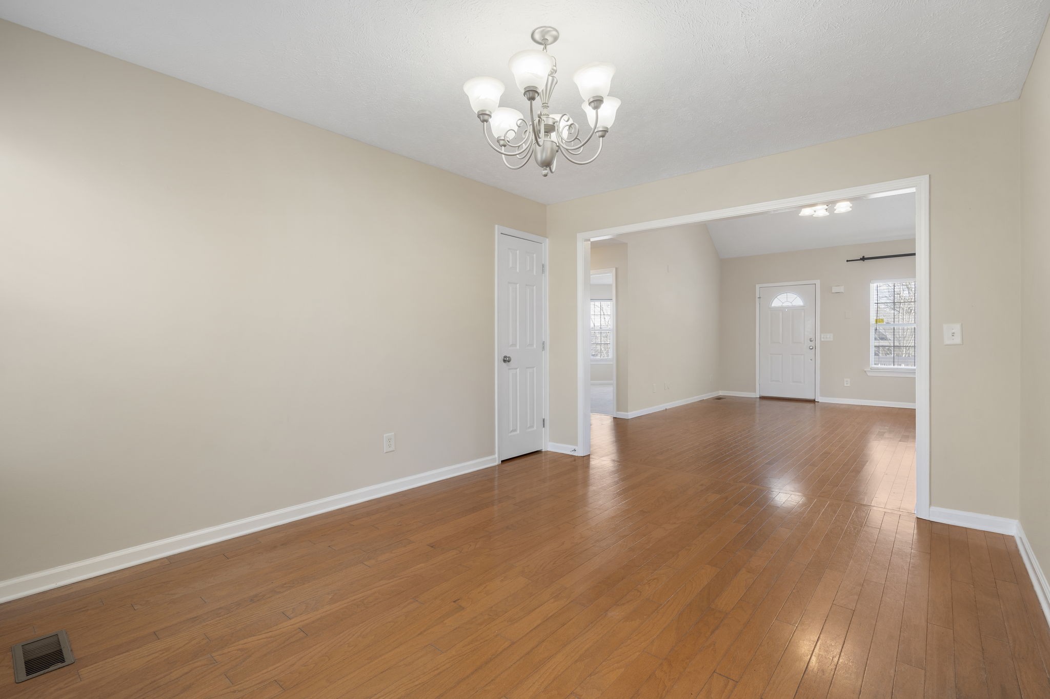 4244 Birmingham Road Lebanon, TN 37090 - Photo 15 of 40 a view of livingroom with hallway and wooden floor