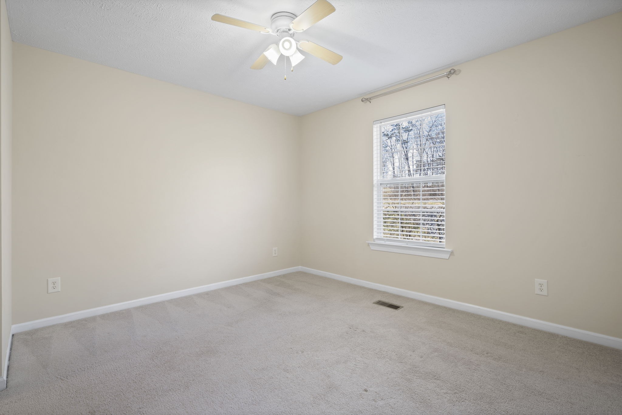 4244 Birmingham Road Lebanon, TN 37090 - Photo 30 of 40 an empty room with a window and a fan