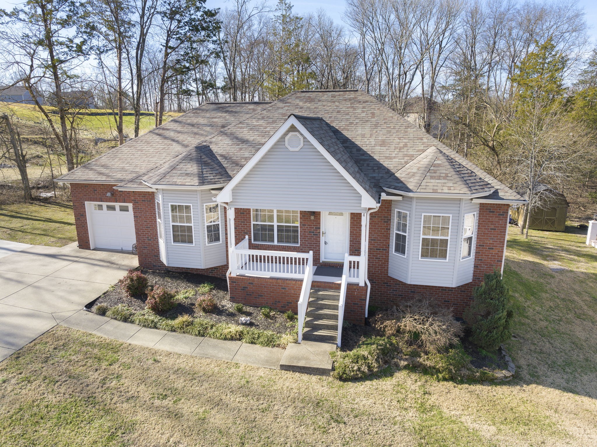 4244 Birmingham Road Lebanon, TN 37090 - Photo 3 of 40 a house with trees in the background