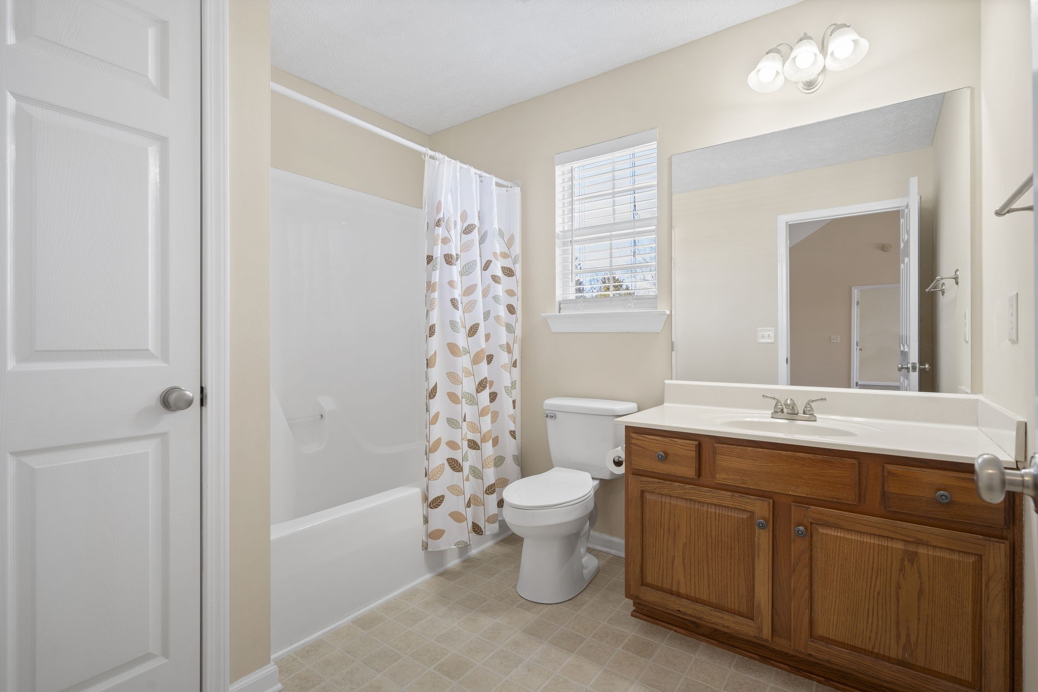 4244 Birmingham Road Lebanon, TN 37090 - Photo 32 of 40 a bathroom with a sink toilet and shower