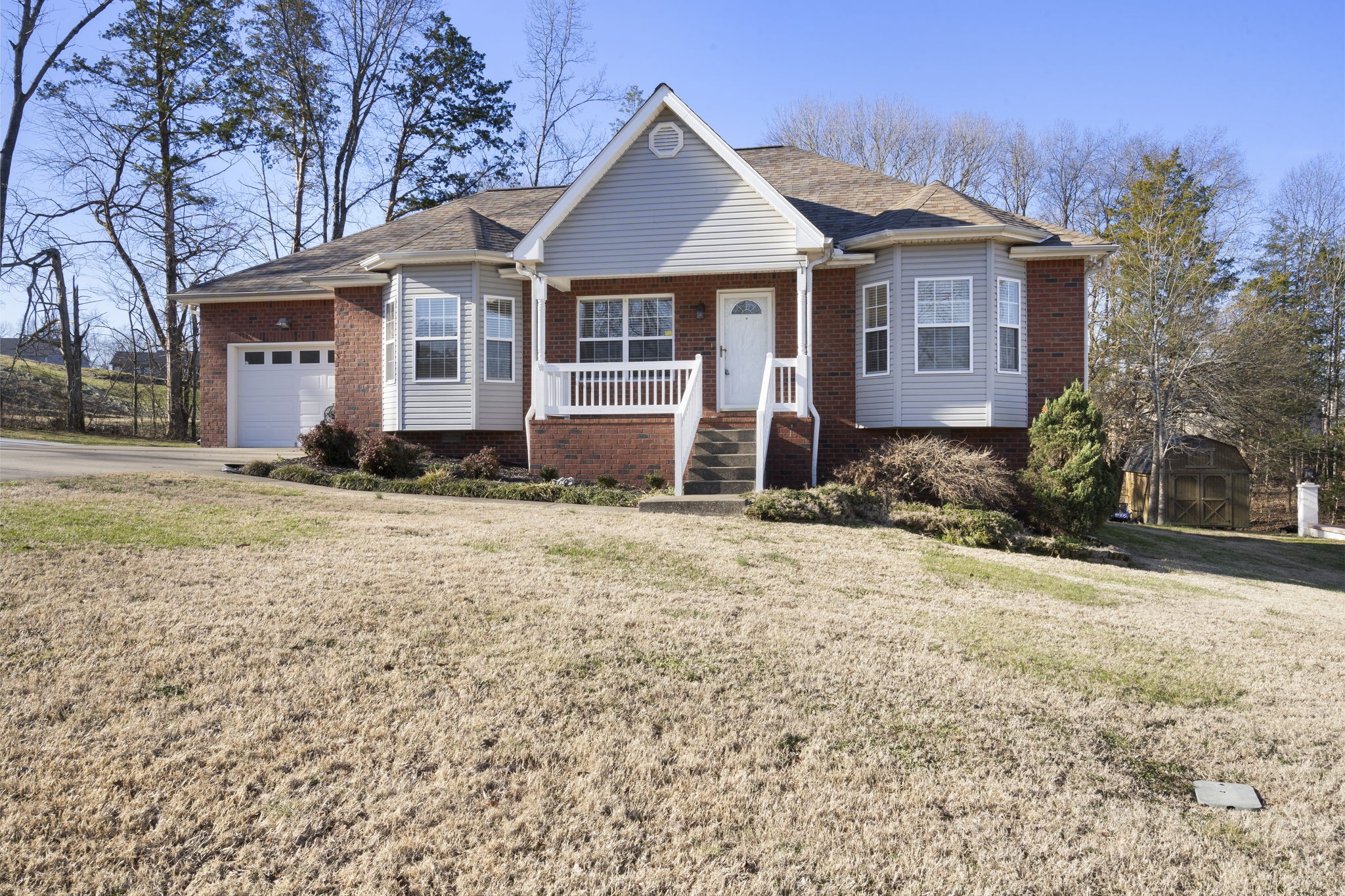 4244 Birmingham Road Lebanon, TN 37090 - Photo 4 of 40 a front view of a house with a yard