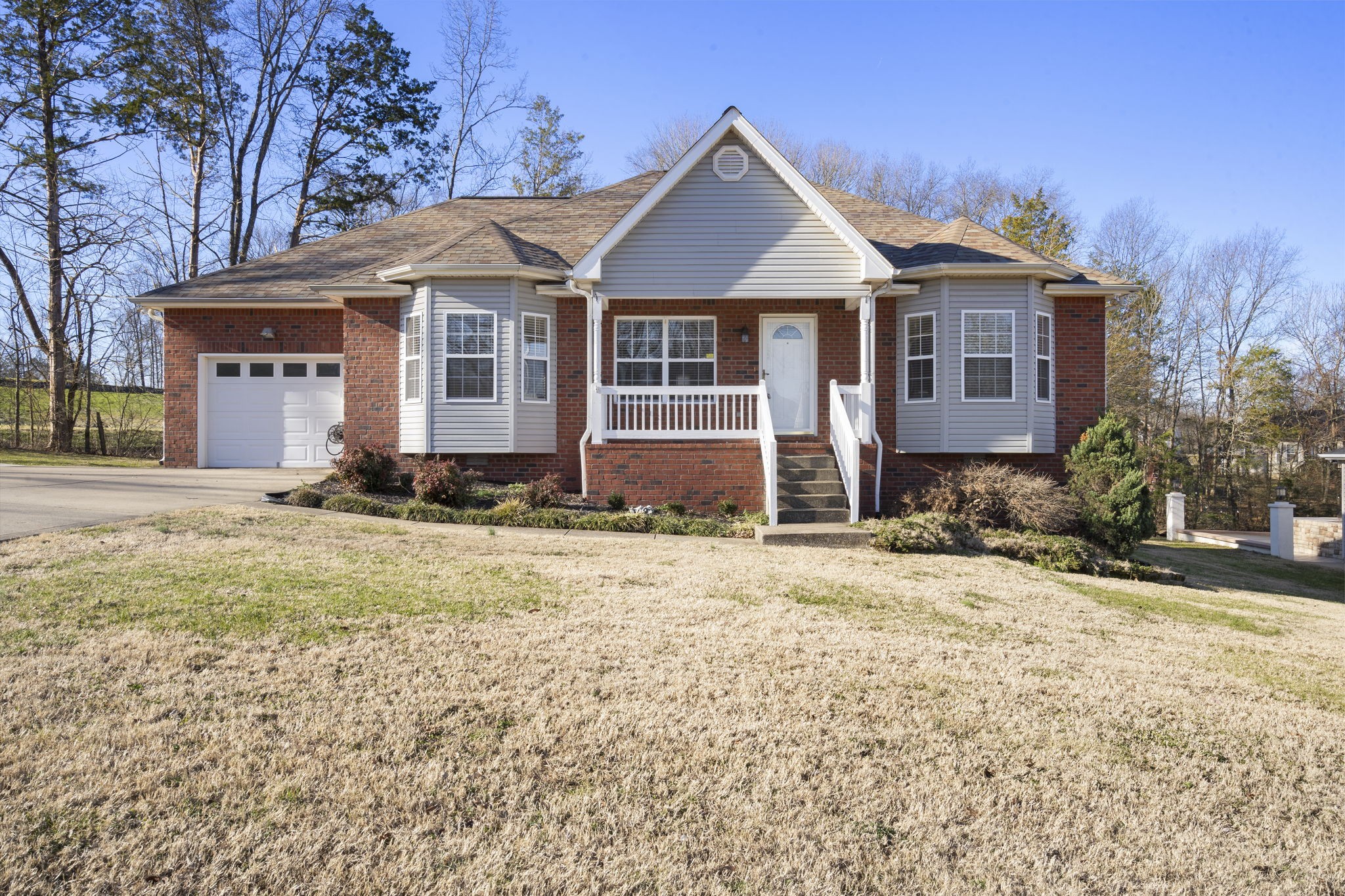 4244 Birmingham Road Lebanon, TN 37090 - Photo 5 of 40 a front view of a house with a yard
