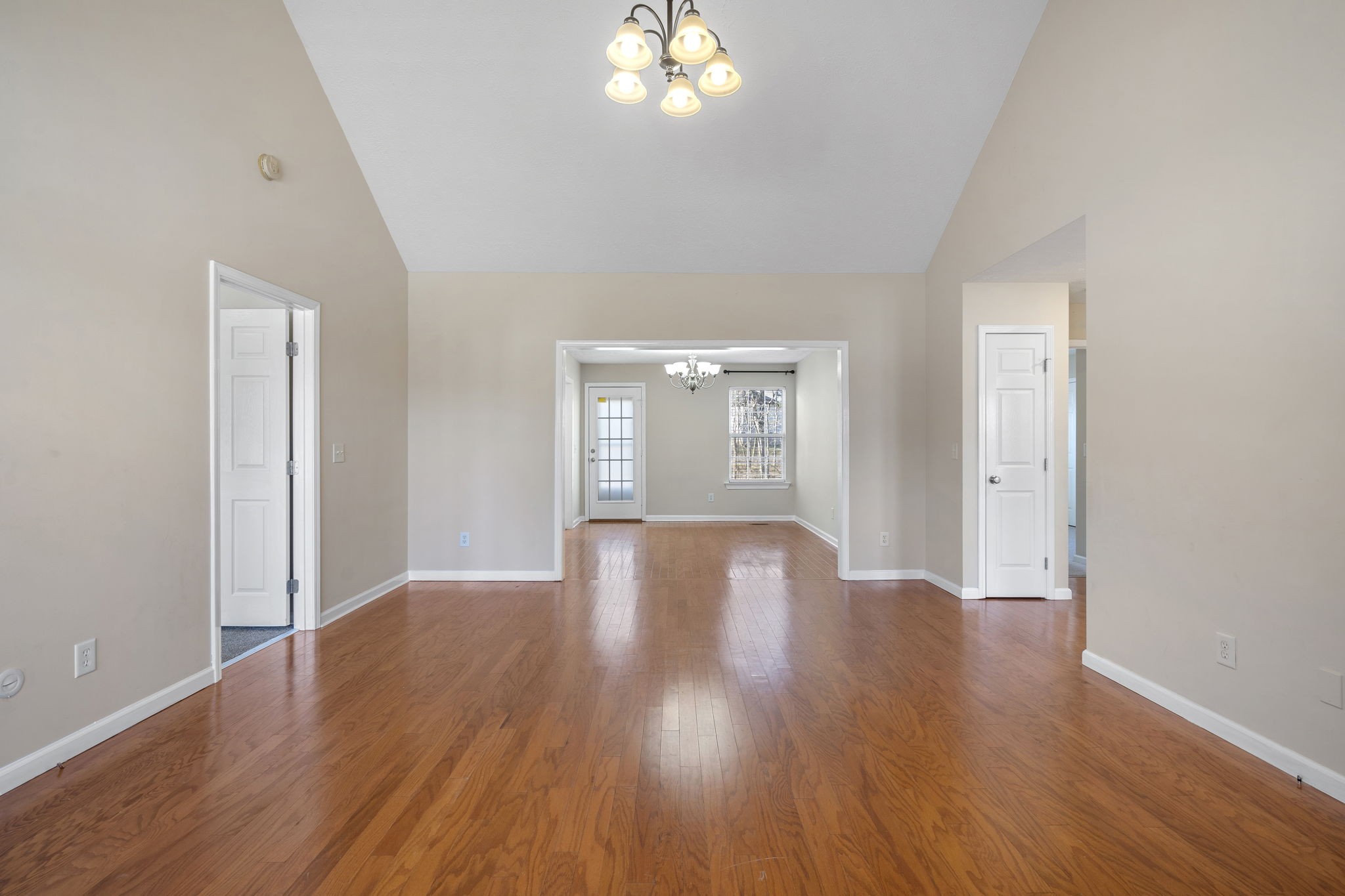 4244 Birmingham Road Lebanon, TN 37090 - Photo 7 of 40 an empty room with wooden floor and windows