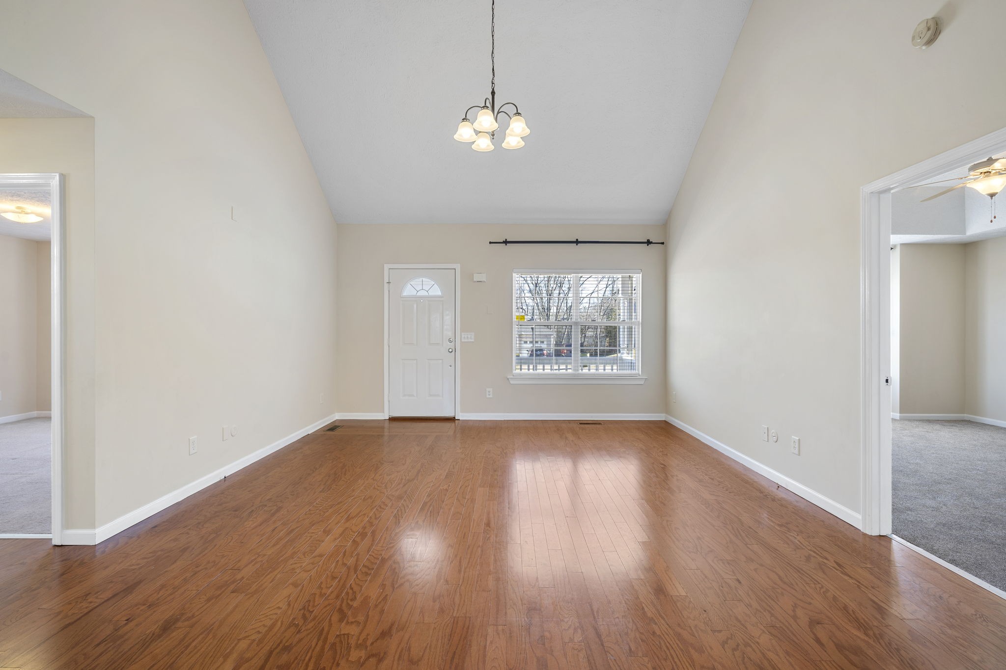 4244 Birmingham Road Lebanon, TN 37090 - Photo 8 of 40 an empty room with wooden floor and windows