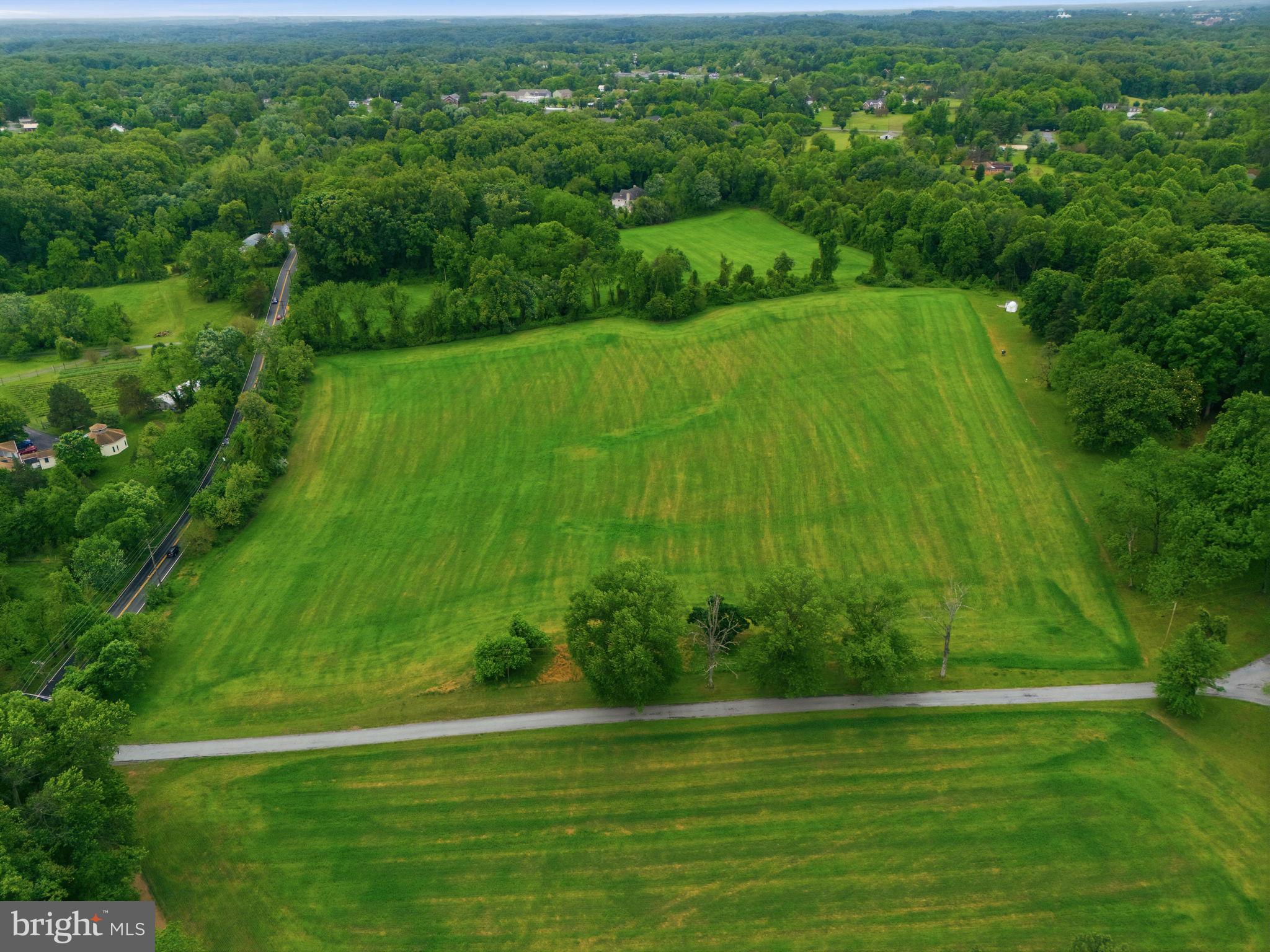250 Ashton Road Ashton, MD 20861 - Photo 4 of 11 a view of a grassy area