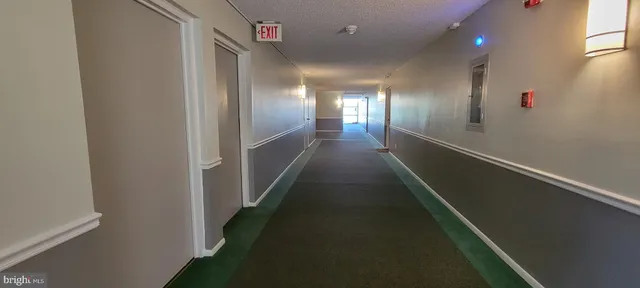 a view of a park with sitting area