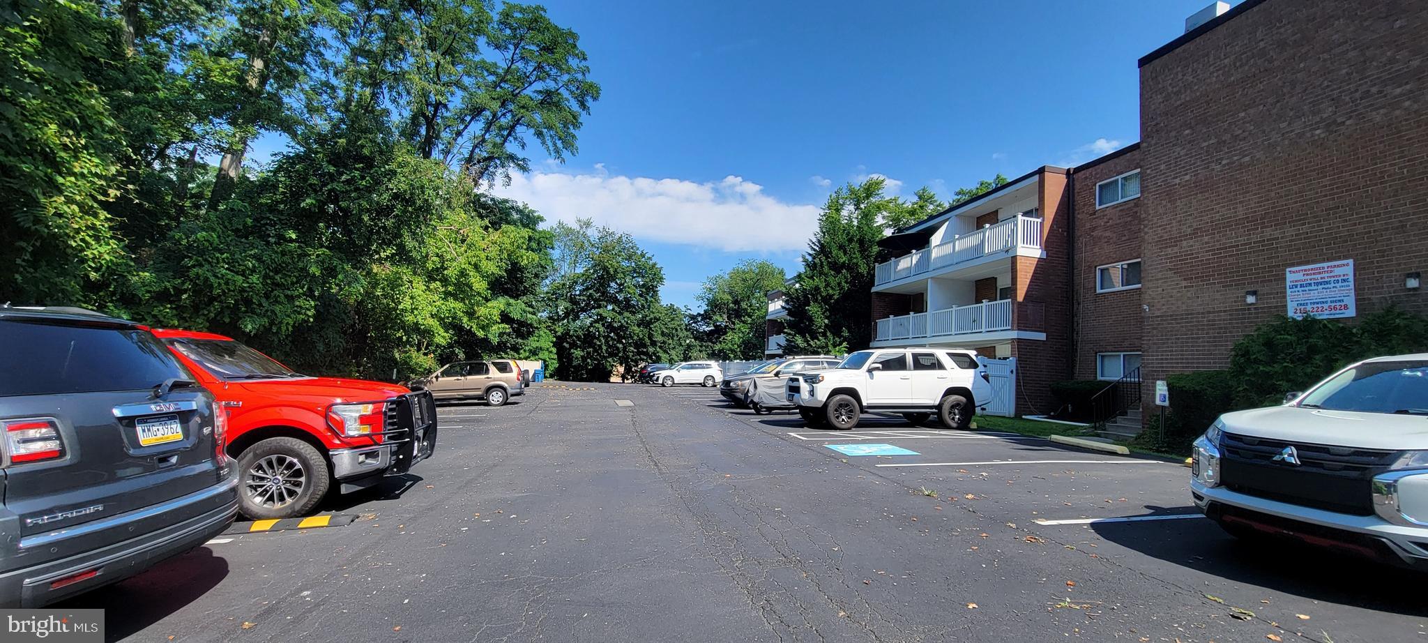 46 Township Line Road, Unit 305 Elkins Park, PA 19027 - Photo 26 of 31 a cars parked in front of a house
