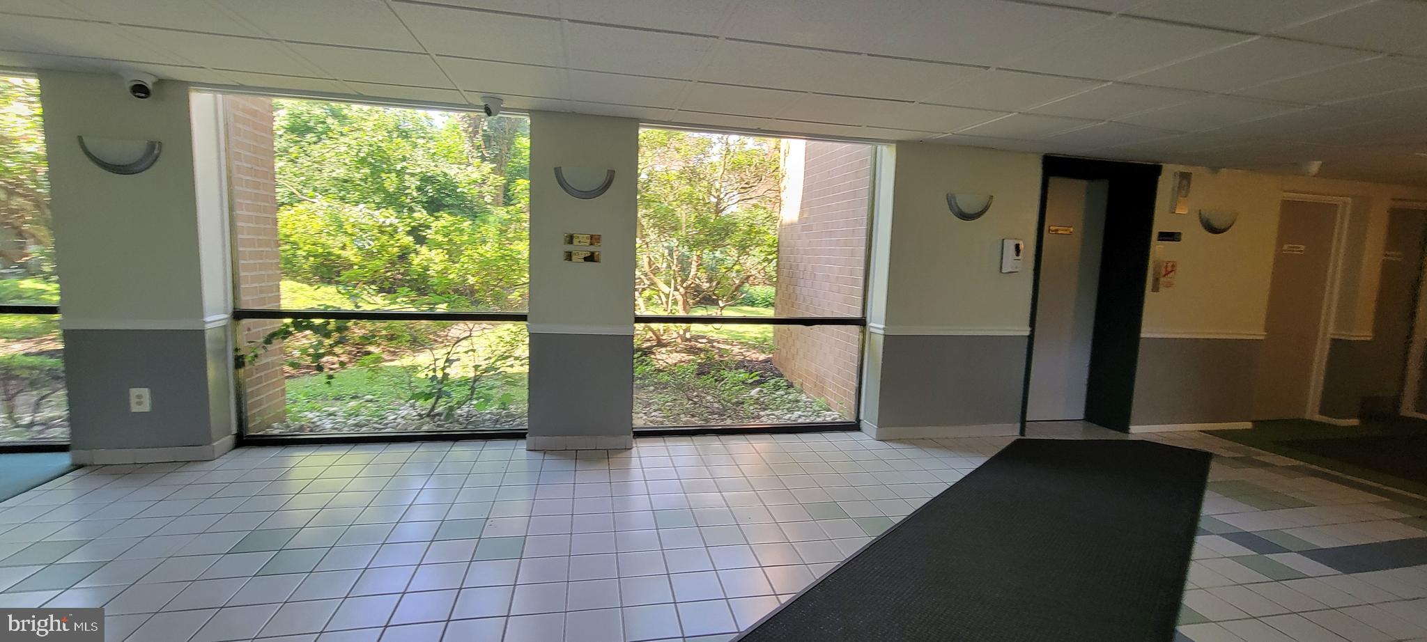 46 Township Line Road, Unit 305 Elkins Park, PA 19027 - Photo 5 of 31 a view of entryway with wooden floor