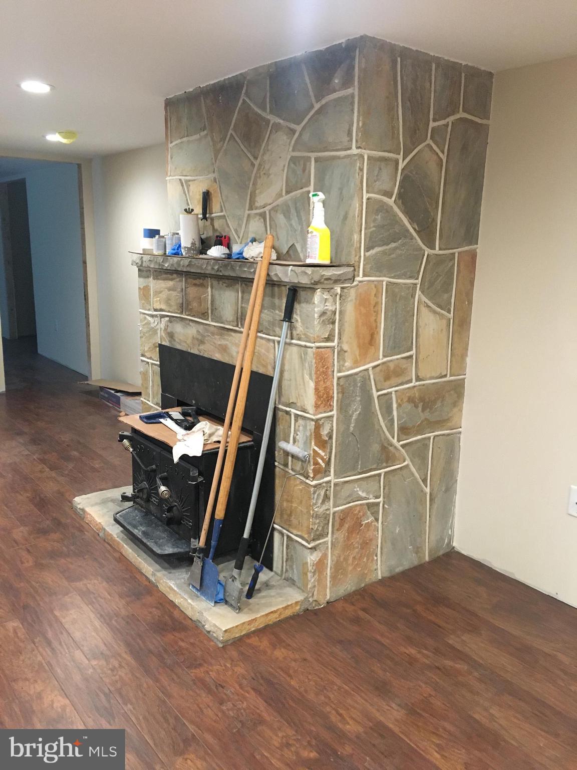 34 Richards Ferry Road Fredericksburg, VA 22406 - Photo 12 of 14 Stone Fireplace in Cozy Fam Rm