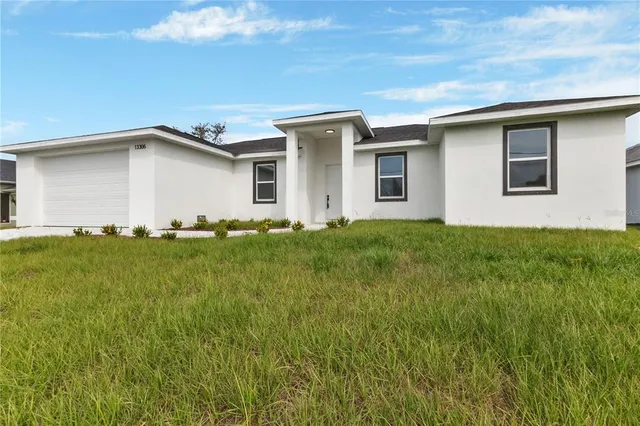 a house view with a garden space