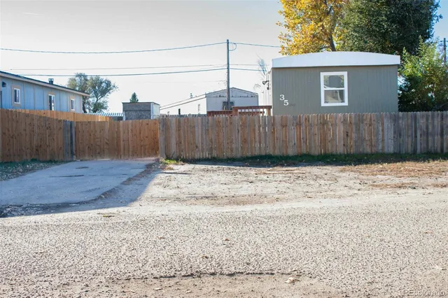 a view of a backyard of the house
