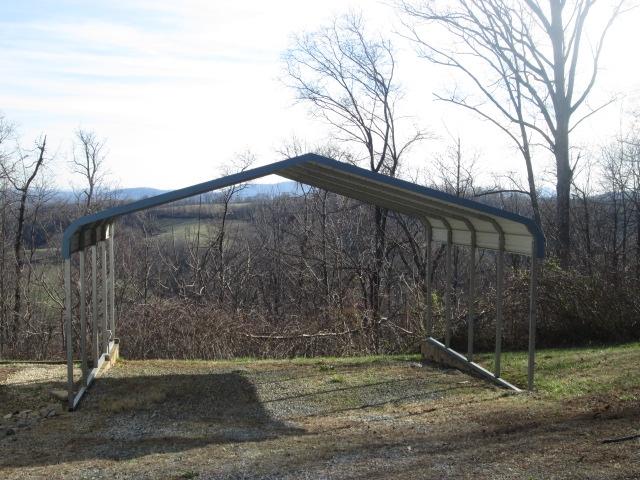 837 Summitt Ridge Drive Blue Ridge, VA 24064 - Photo 21 of 29 a backyard of a house with lots of green space