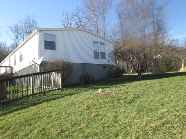 837 Summitt Ridge Drive Blue Ridge, VA 24064 - Photo 23 of 29 a backyard of a house with lots of green space