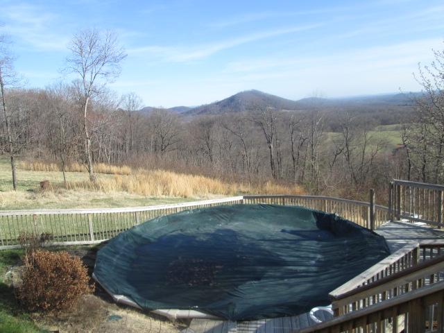 837 Summitt Ridge Drive Blue Ridge, VA 24064 - Photo 28 of 29 a view of a swimming pool with a yard