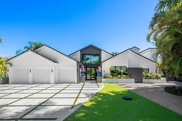 a view of entryway with window and wooden floor