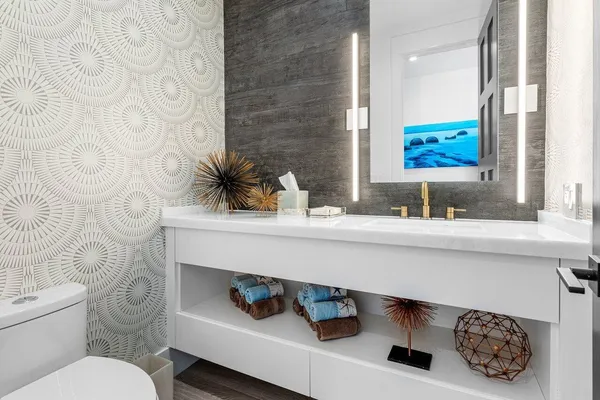 a bedroom with a bed and flat screen tv