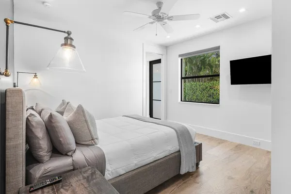 a room with furniture and a flat screen tv